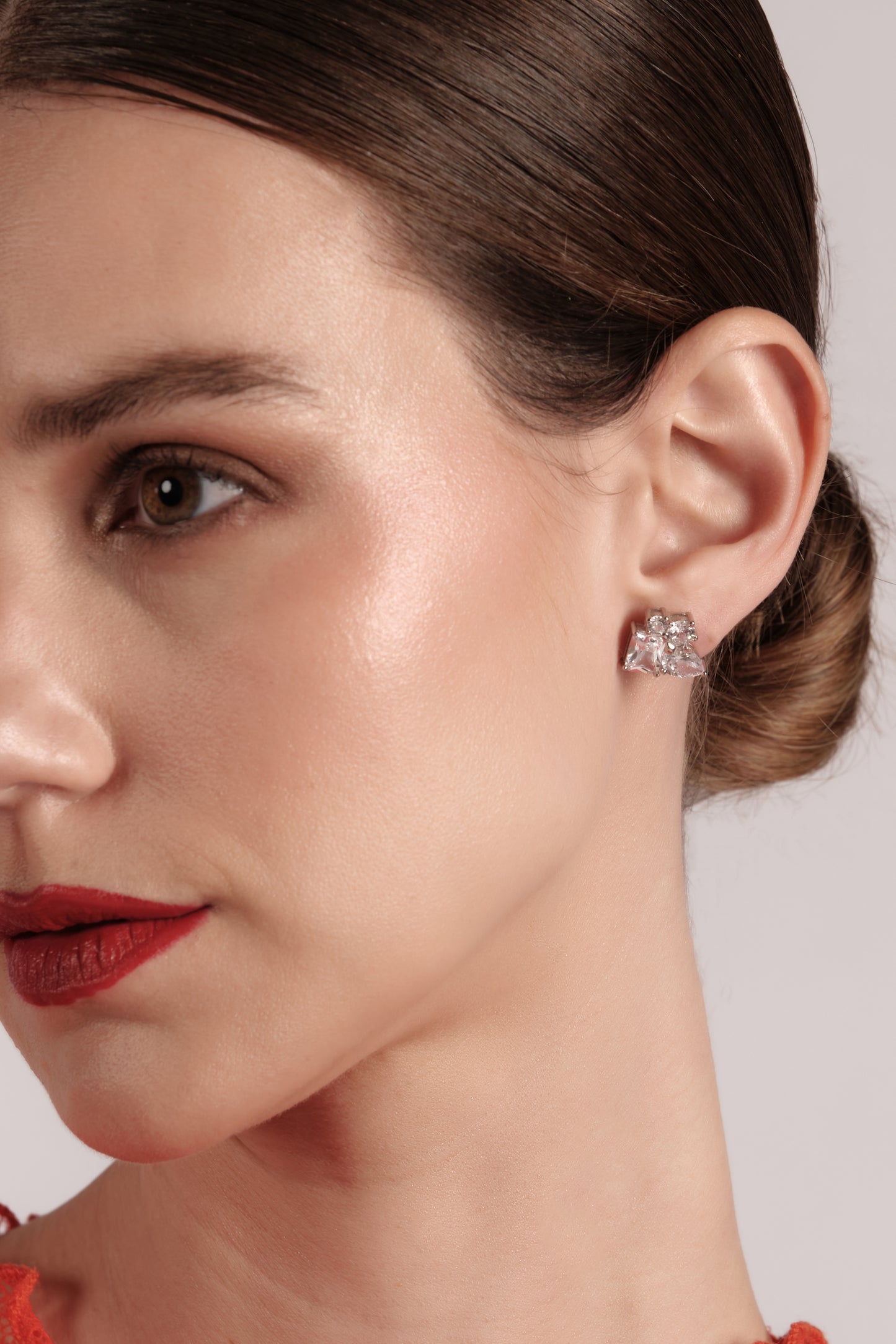 Close-up of Atelier Geo Studs — 925 sterling silver geometric stone stud earring on model1