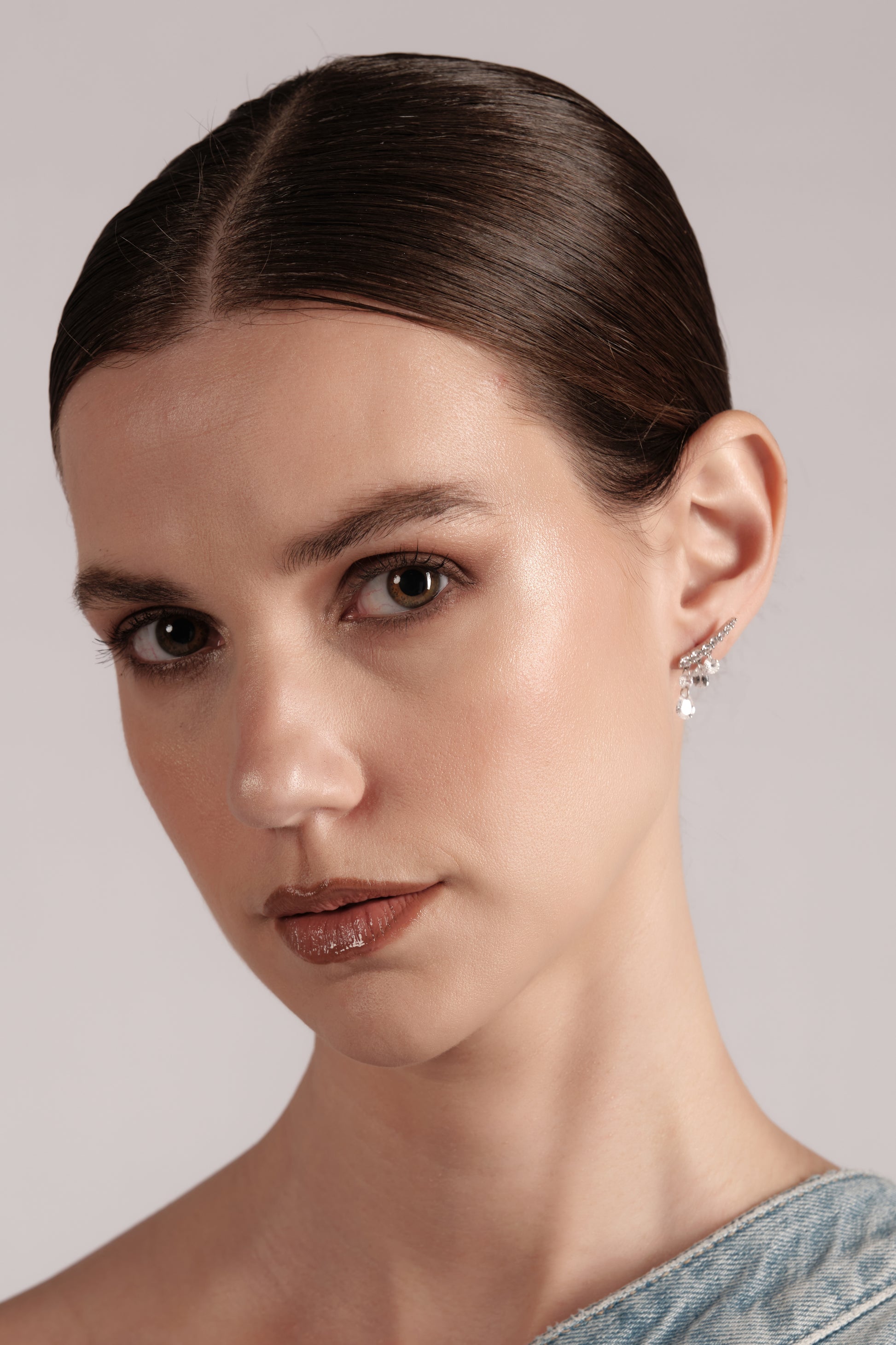 Model wearing Crystal Tear pavé teardrop CZ drop earrings — Belle Époque inspired evening styling