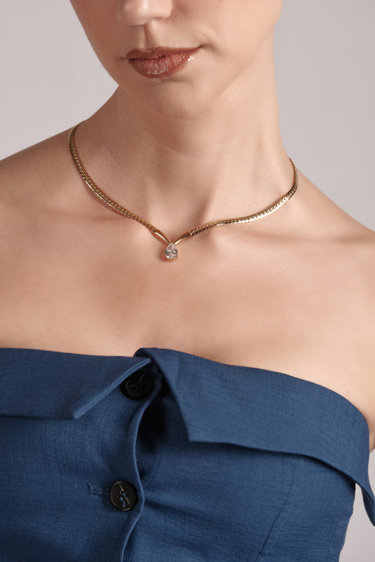 Close-up of gold‑plated stainless steel necklace with pear cubic zirconia teardrop pendant — Teardrop de Lumière